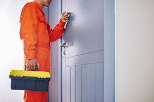 plumber knocking on door